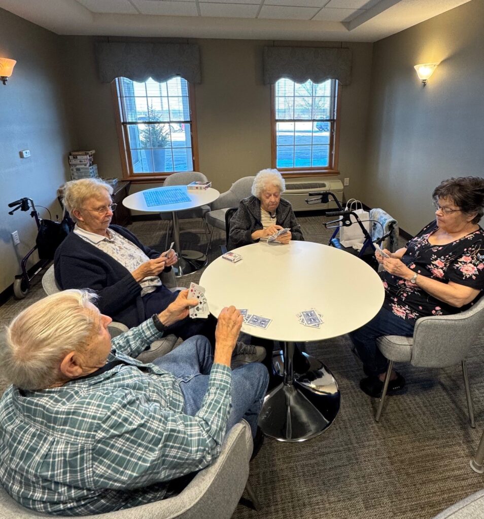 elderly playing cards